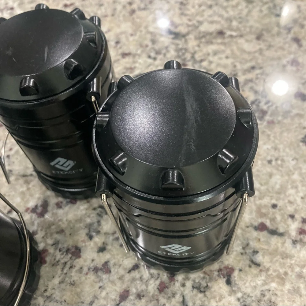 Set of 4 Etekcity black LED travel/camping lanterns Preowned **No Batteries**